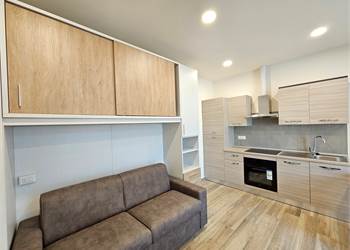 Monolocale ristrutturato con posto auto in casa d’epoca a Grandate